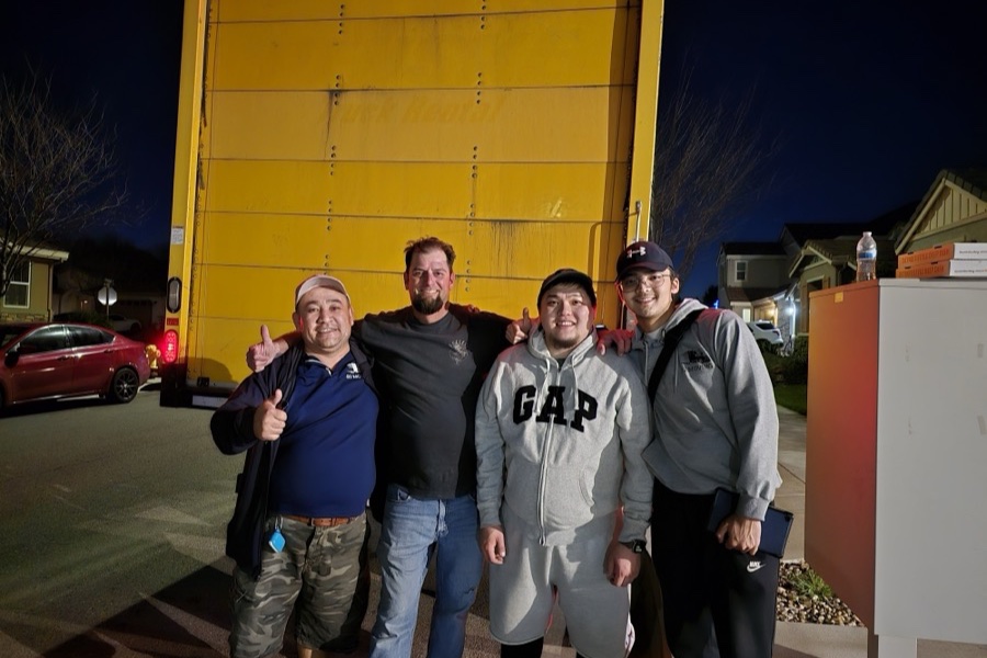 Happy customers with the crew after the move